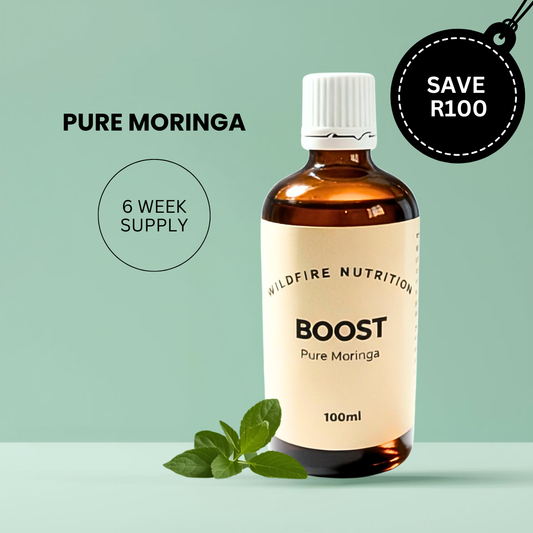 Bottle of Wildfire Nutrition Boost Pure Moringa on a light green background. Boost energy drops. Holiday Sale.
